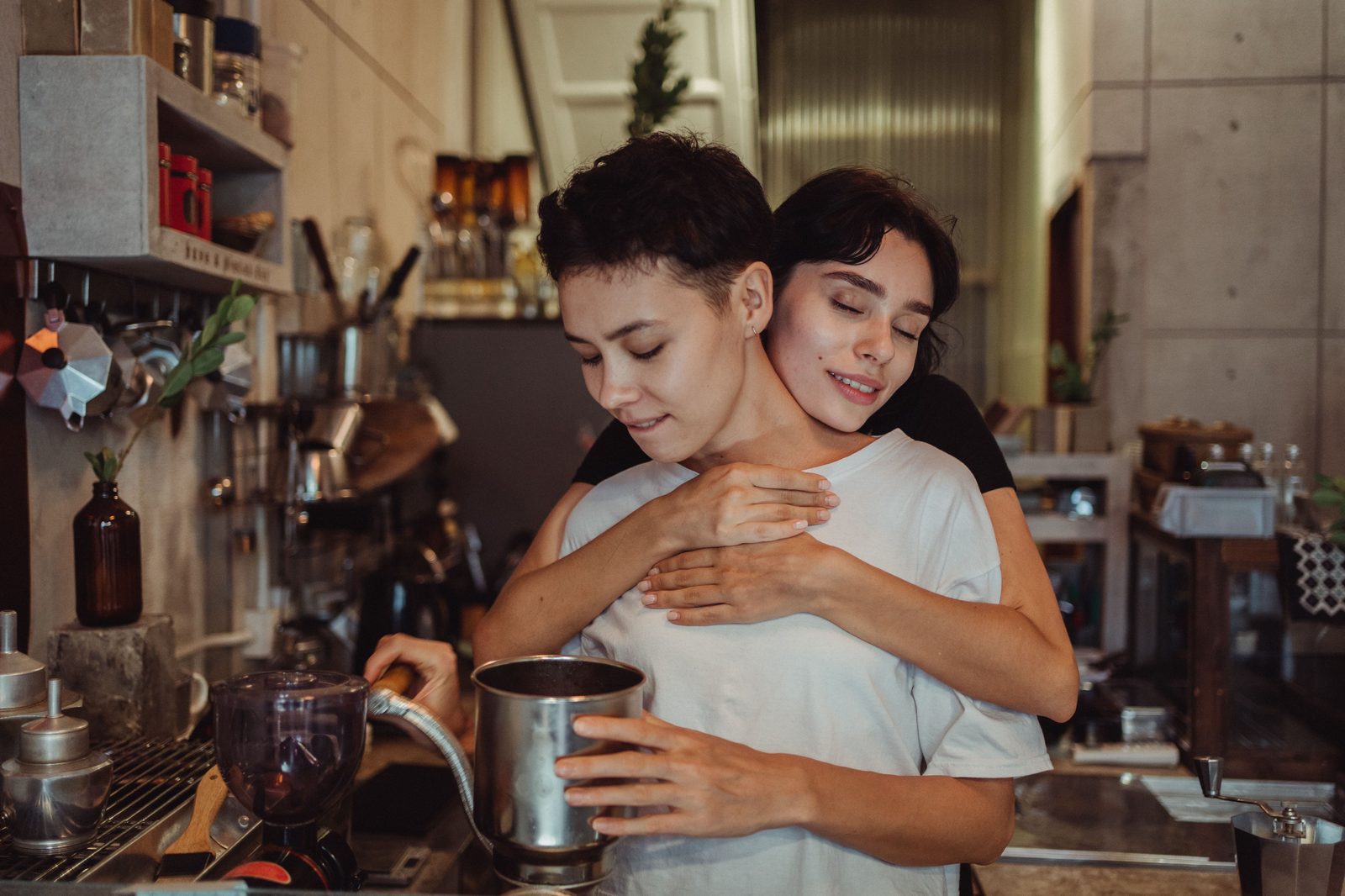 A couple sharing a warm, natural embrace